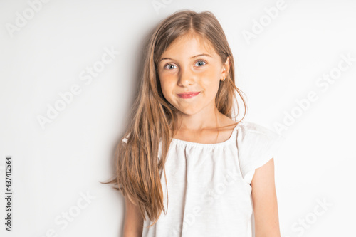 stylish little girl portrait in the studio white background