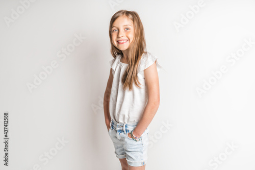 stylish little girl portrait in the studio white background © Louis-Photo