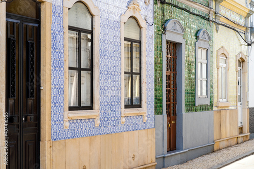 Fototapeta Naklejka Na Ścianę i Meble -  Beautiful houses cover with traditional tiles called azulejo, Olhao, Portugal