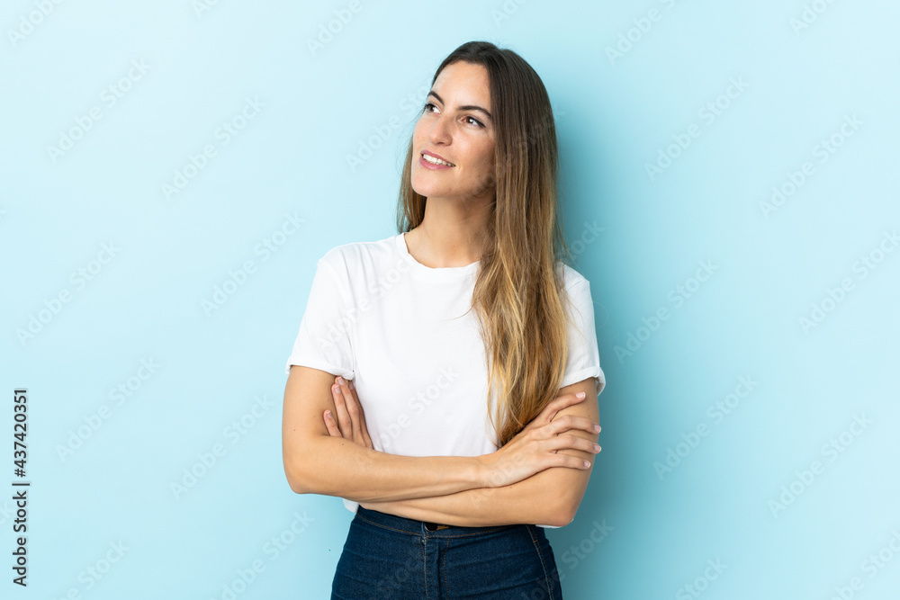 Young caucasian woman over isolated background looking to the side Young caucasian woman over isolated background looking to the side