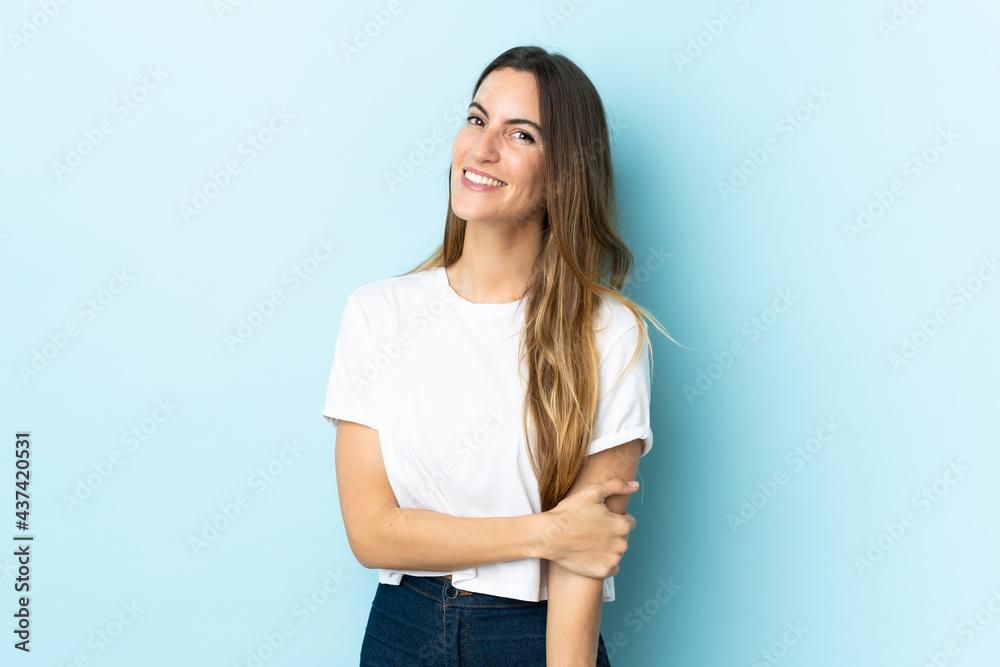 Young caucasian woman over isolated background laughing Young caucasian woman over isolated background laughing
