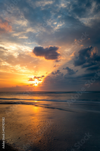 Dramatic clouds and sunrise over Atlantic Ocean
