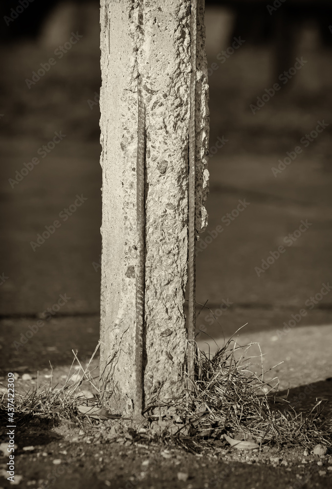 The old reinforced concrete support is badly damaged, rusty reinforcement is visible.