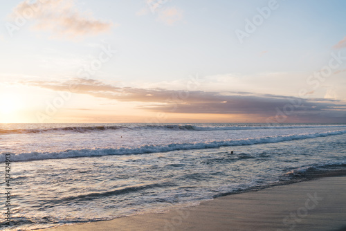 Waving ocean during sunset in evening