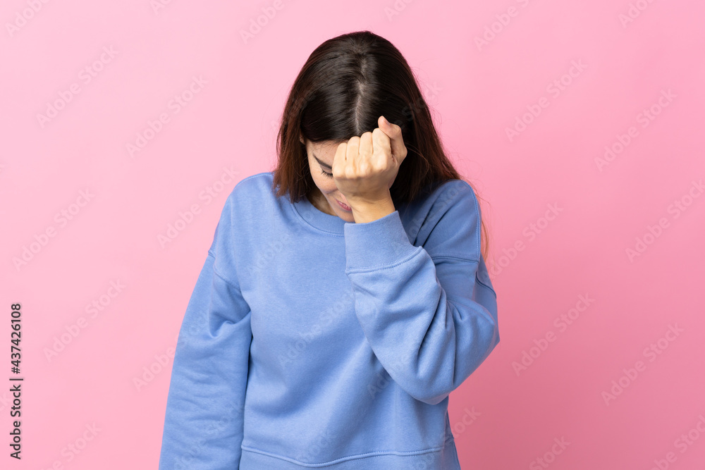 Young caucasian woman isolated on pink background with headache Young caucasian woman isolated on pink background with headache
