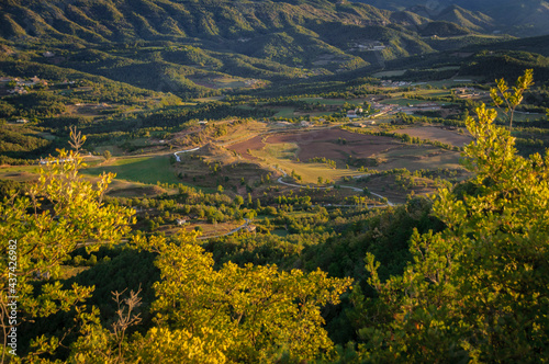 Autumnal sunrise seen from the Santuari dels Munts viewpoint in Lluçanès (Osona, Barcelona, Catalonia, Spain)