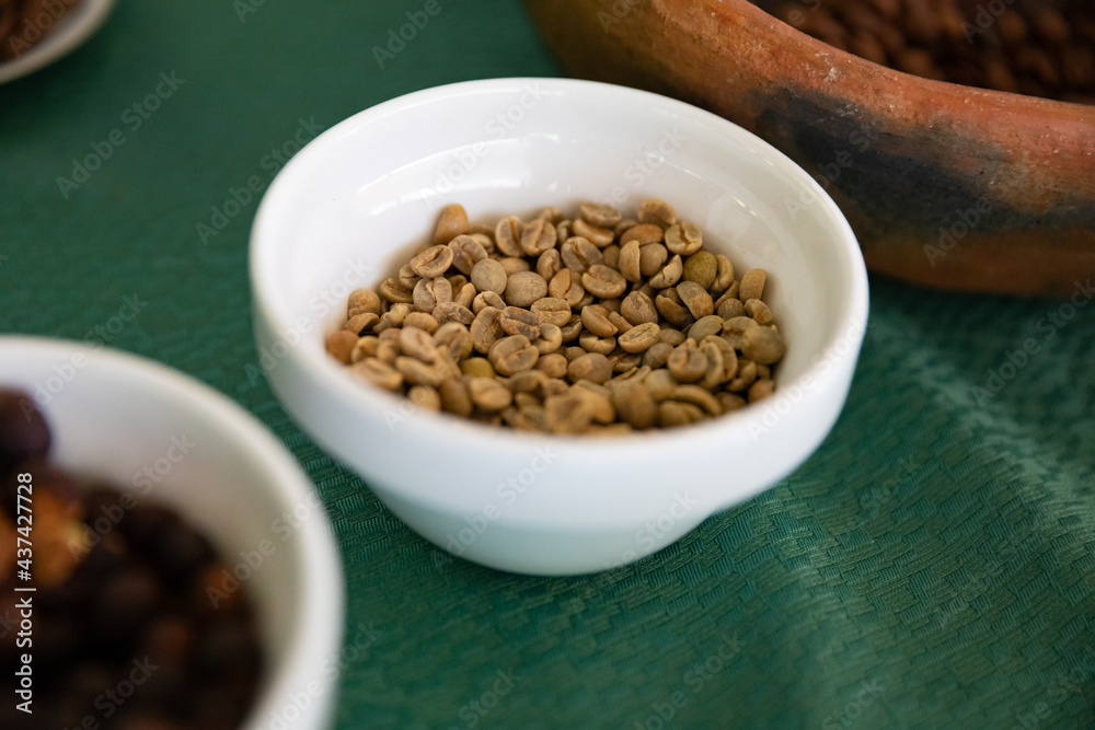 Bowls of beans showing the process of coffee production Bowls of beans showing the process of coffee production