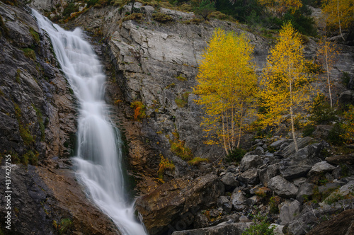 Cascade in the Bujaruelo valley in autumn (Ordesa and Monte Perdido National Park, Pyrenees, Spain)