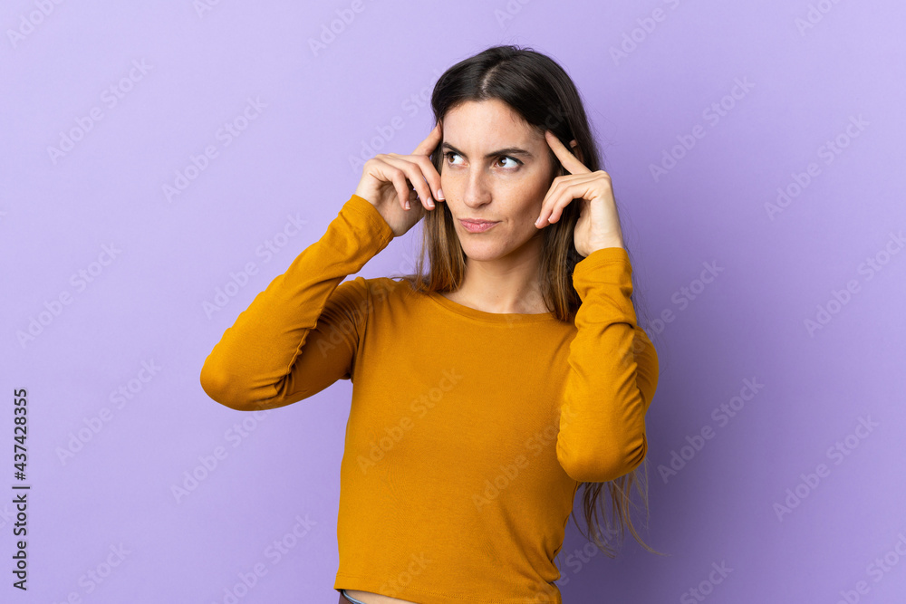 Young caucasian woman over isolated background having doubts and thinking Young caucasian woman over isolated background having doubts and thinking