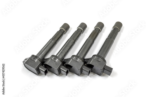 Obraz na płótnie Ignition coil of car engine on white background, isolated, Car maintenance service. w salonie