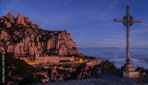 Montserrat and the Montserrat abbey at sunrise, from the Creu de Sant Miquel viewpoint (Barcelona province, Catalonia, Spain)