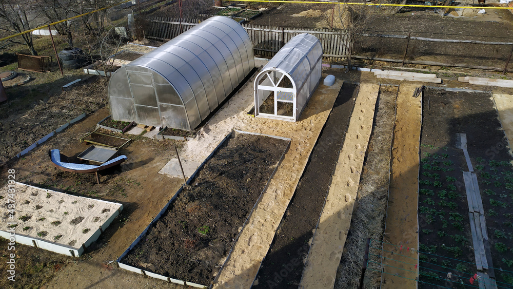 Garden beds. Vegetable garden top view. Garden design and greenhouse layout. Garden beds. Vegetable garden top view. Garden design and greenhouse layout.