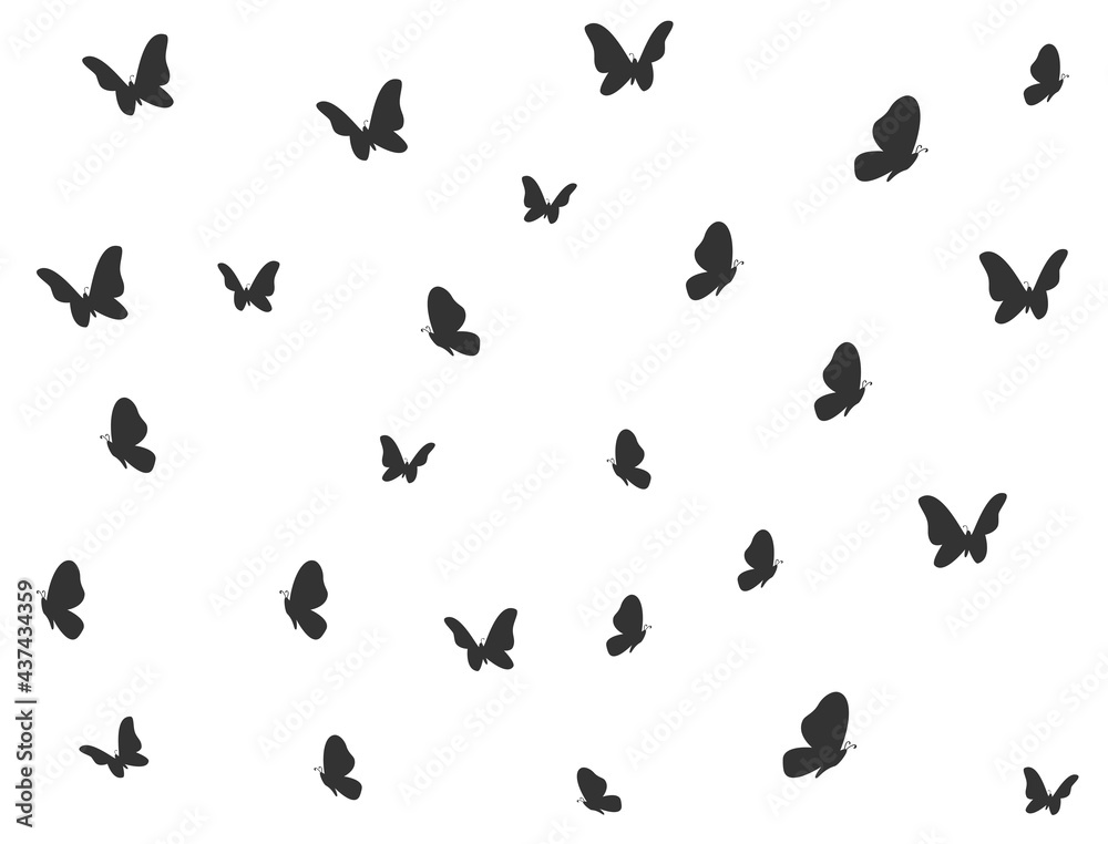 Black butterflies flying in all directions