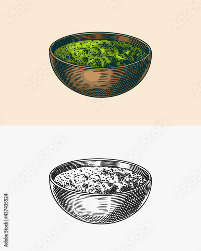 Pesto sauce. Basil soup in the bowl. Engraved hand drawn sketch.