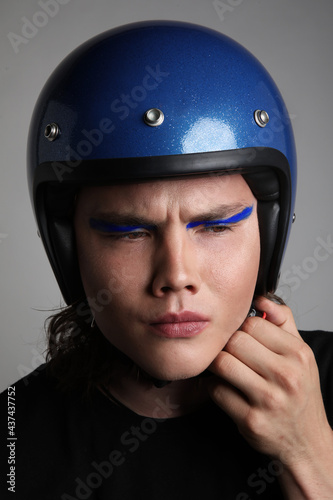 Attractive motor biker in blue helmet mockup set. Vertical headshot. © face_reader_img