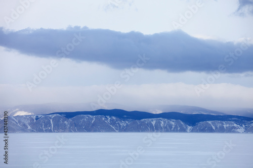 Baikal lake winter landscape. Snowy mountains