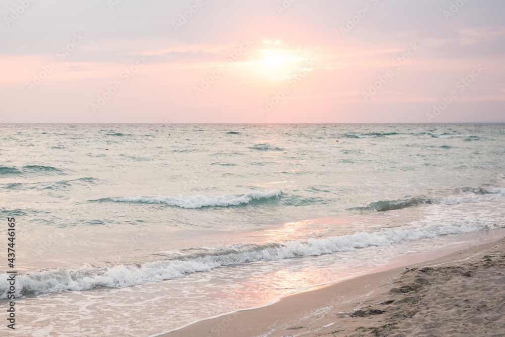 Sunset sea with beach