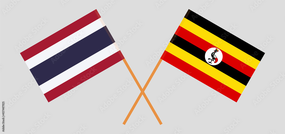 Crossed flags of Thailand and Uganda. Official colors. Correct proportion