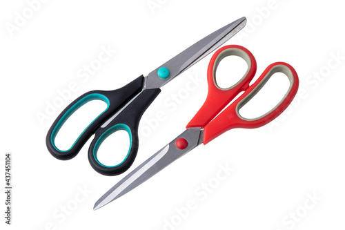 A pair of used scissors on white background 