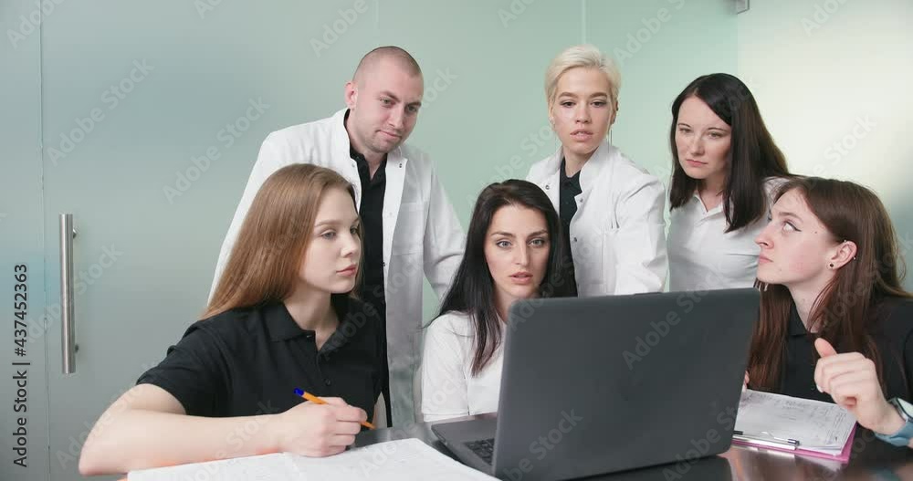 Vet doctors brainstorming in meetiing room. Animal cliniic Vet doctors brainstorming in meetiing room. Animal cliniic