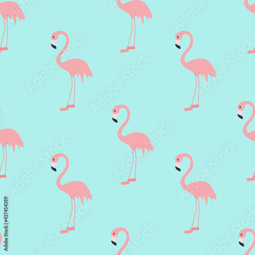 Seamless pattern with flamingos on a blue background.