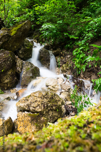 Fototapeta Naklejka Na Ścianę i Meble -  Waterfall in Cherek gorge in the Caucasus mountains in Russia