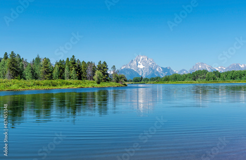 Grand Teton peaks by Snake River in summer by Oxbow Bend, Grand Teton national park, Wyoming, USA. © SL-Photography