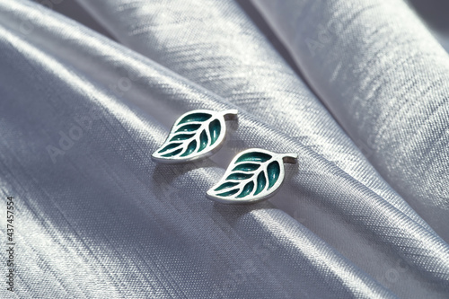 Fashionable sterling silver stud earrings in form of leaves