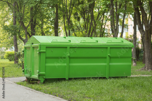 Covered container for construction and household waste