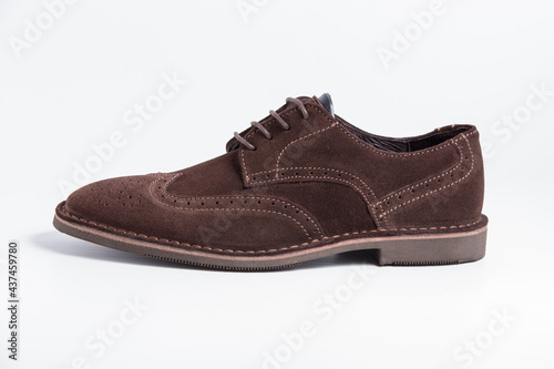 Male brown leather elegant shoe on white background, isolated product, comfortable footwear.