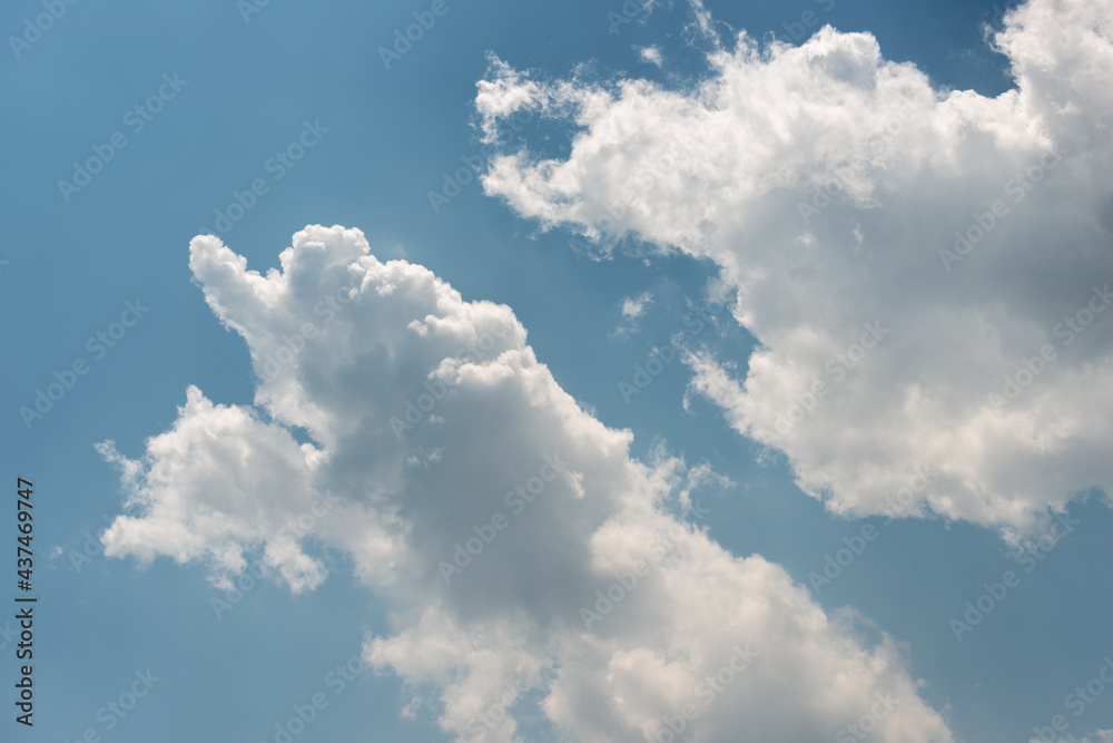 blue sky with fluffy clouds blue sky with fluffy clouds