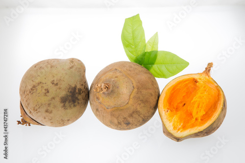 Organic sapote fruit on the table - Matisia cordata photo