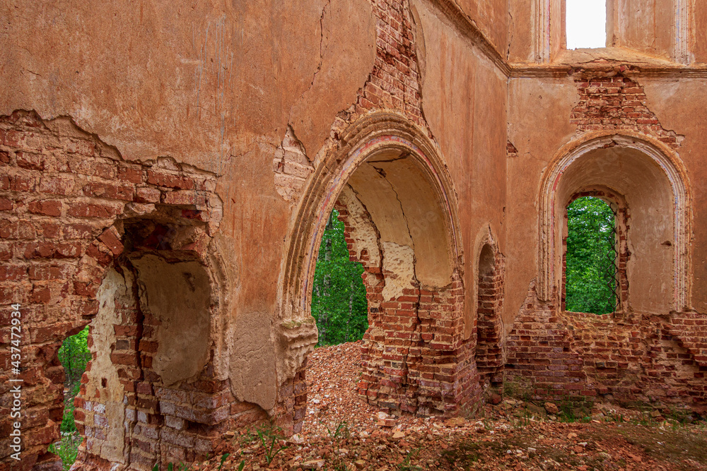 The arch in the abandoned old red brick church. Inside view. Russia, Smolensk region, 1753.