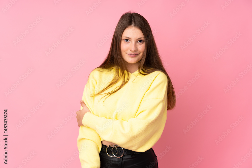 Teenager caucasian girl isolated on pink background laughing Teenager caucasian girl isolated on pink background laughing