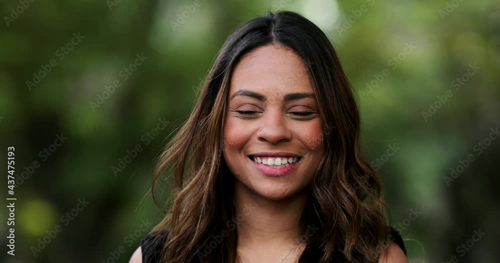 Latina hispanic young woman laughing and smiling portrait Latina hispanic young woman laughing and smiling portrait