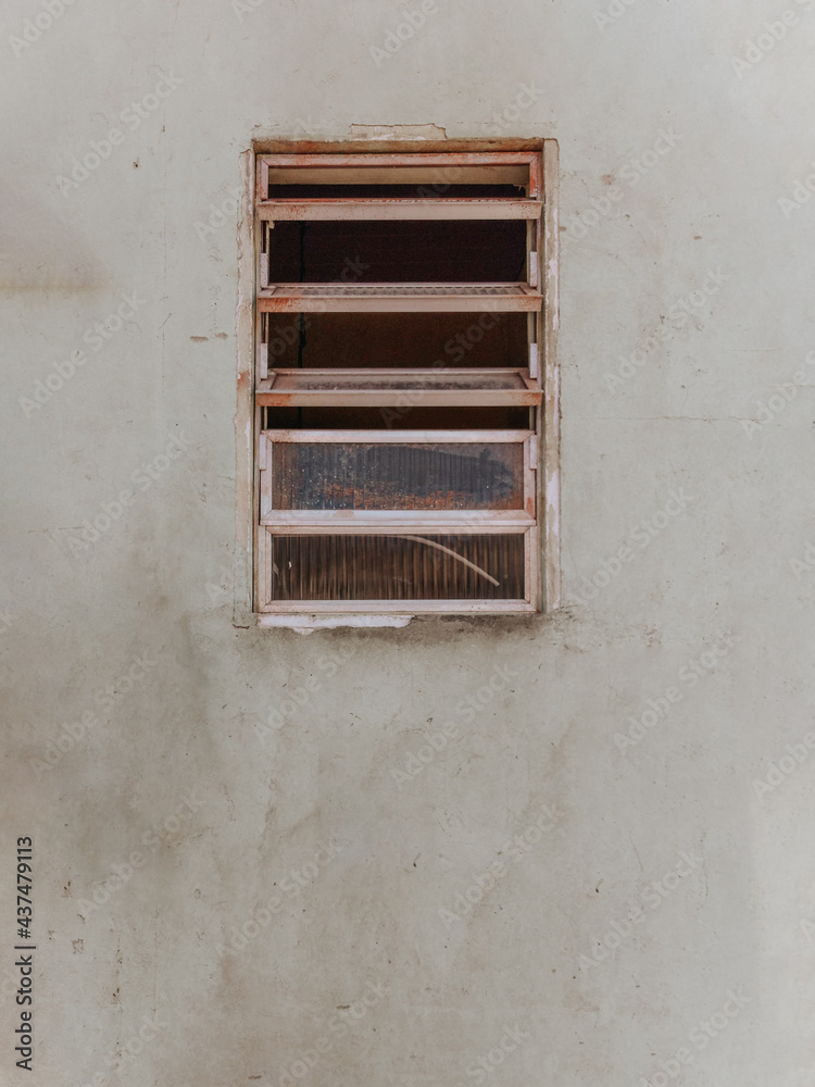 window in a cement wall in a favela in Rio de Janeiro window in a cement wall in a favela in Rio de Janeiro