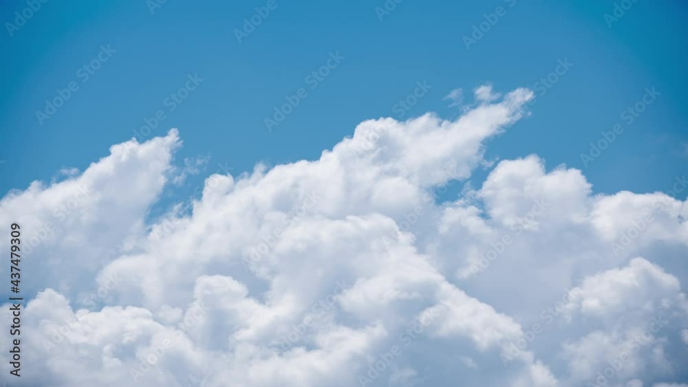4K Time Lapse of white clouds moving on bright blue sky. Weather forming, environment, climate change concept. 4K Time Lapse of white clouds moving on bright blue sky. Weather forming, environment, climate change concept.