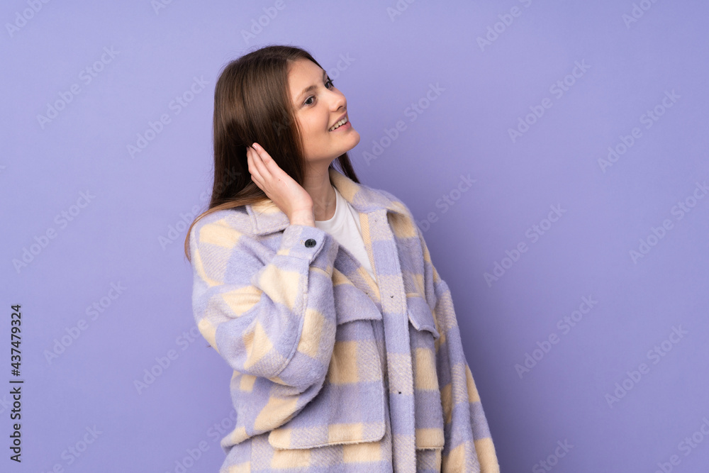 Teenager caucasian girl isolated on purple background thinking an idea Teenager caucasian girl isolated on purple background thinking an idea