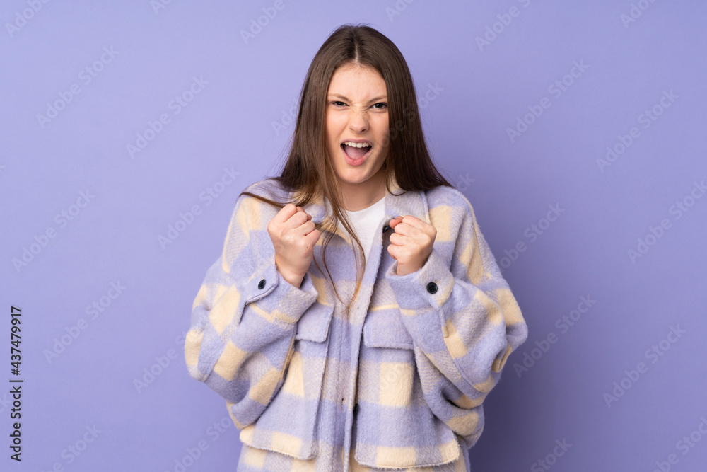 Teenager caucasian girl isolated on purple background frustrated by a bad situation Teenager caucasian girl isolated on purple background frustrated by a bad situation