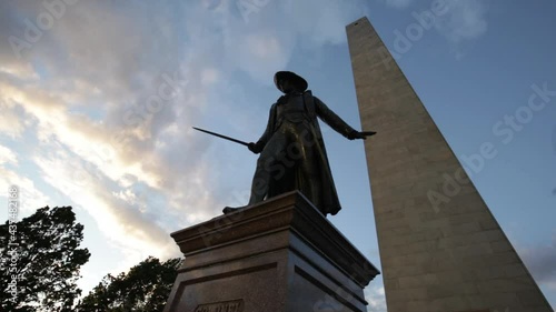 bunker hill monument and Prescott statue with moving clouds