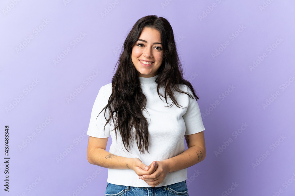 Young caucasian woman isolated on purple background laughing Young caucasian woman isolated on purple background laughing