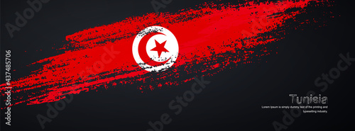 Grunge brush of Tunisia flag on shiny black background. Creative glitter sparkle brush paint vector illustration