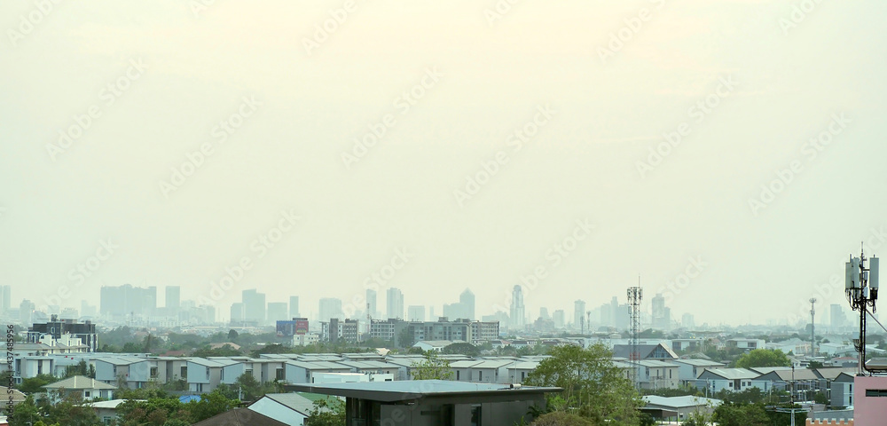 A panoramic view of the city covered with pm2.5 dust in the evening.