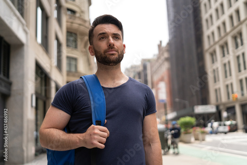 Young caucasian man on city street