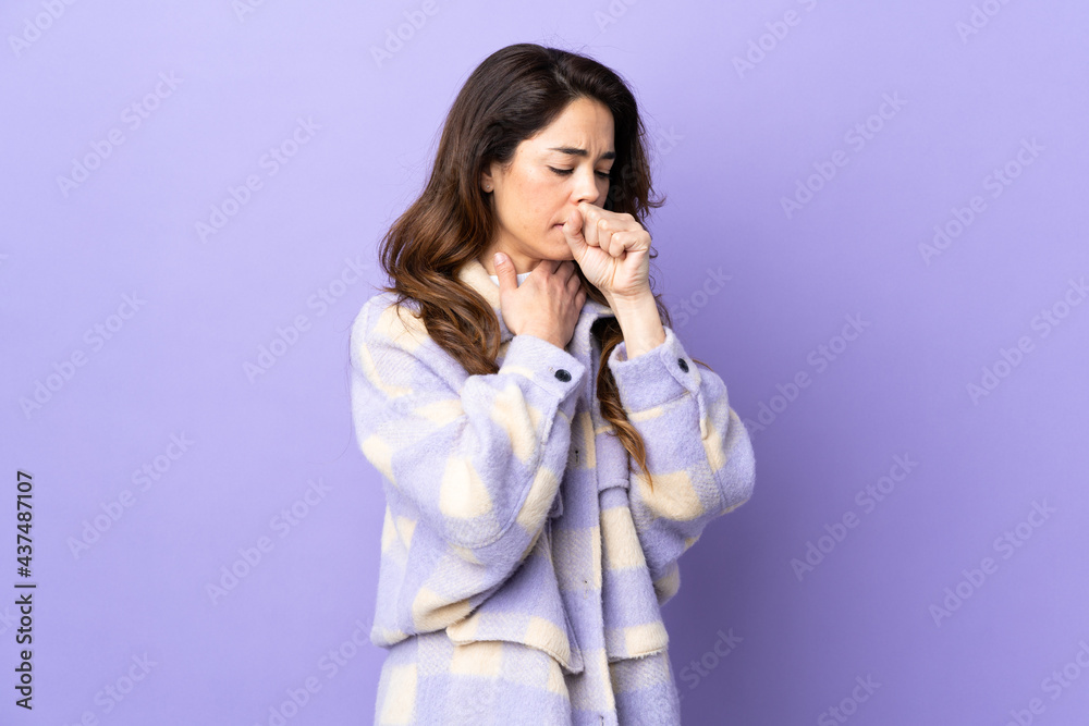 Woman over isolated purple background coughing a lot Woman over isolated purple background coughing a lot