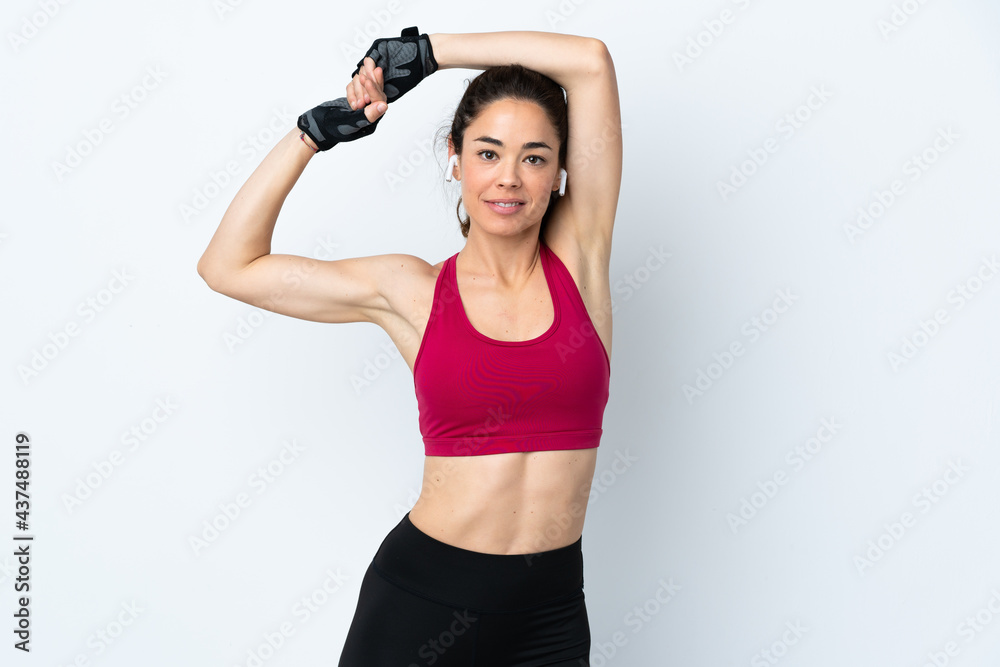 Sport woman over isolated white background stretching Sport woman over isolated white background stretching