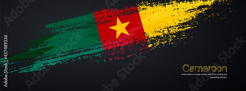 Grunge brush of Cameroon flag on shiny black background. Creative glitter sparkle brush paint vector illustration