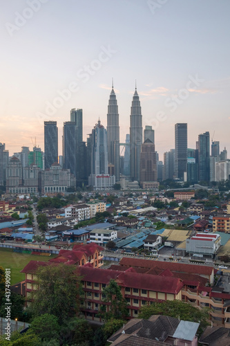 Photography view of kuala lumpur skyline during sunrise