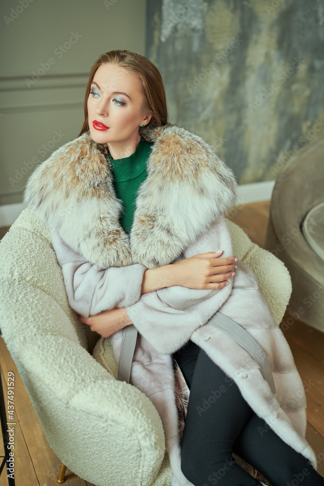 wealthy woman in fur coat wealthy woman in fur coat