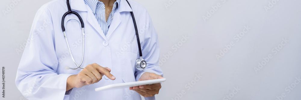 A male doctor undertaking patient consultations and physical examinations at the specialized hospital A male doctor undertaking patient consultations and physical examinations at the specialized hospital